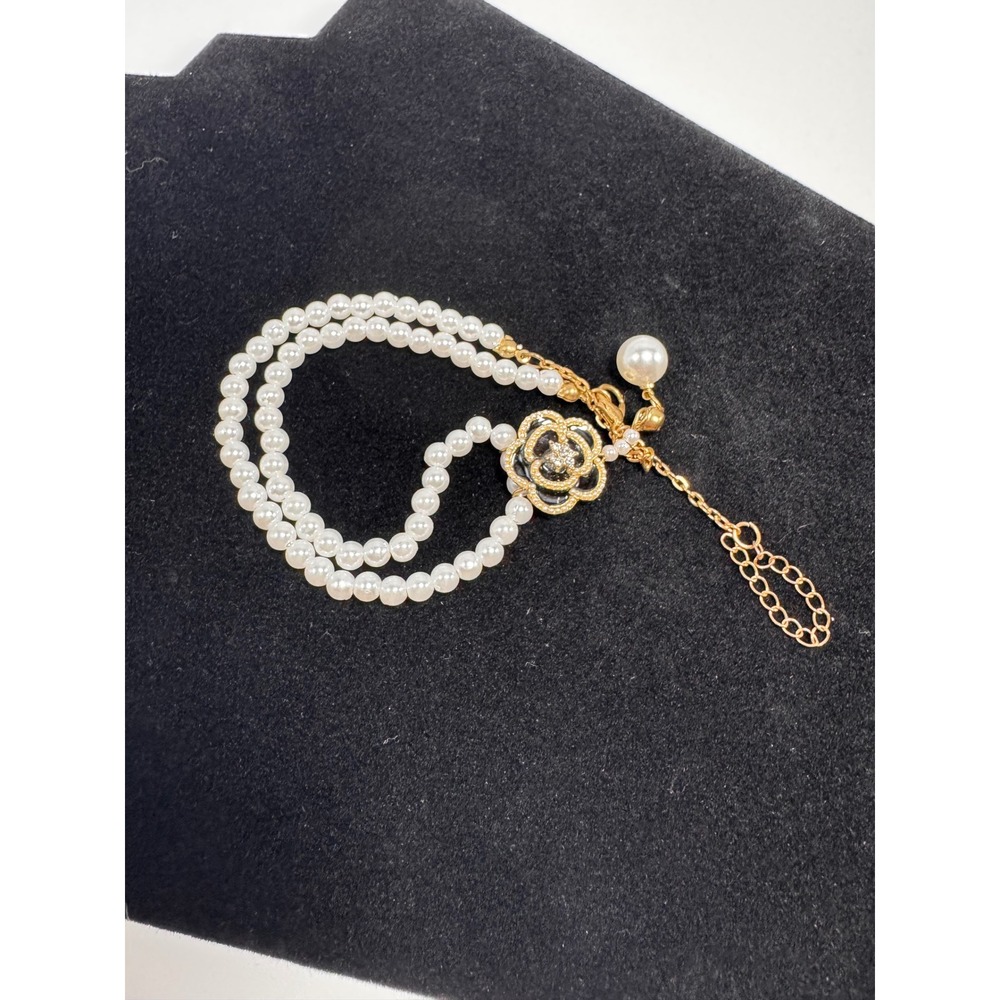 Pearl Double Strand Bracelet with Gold Flower Accent